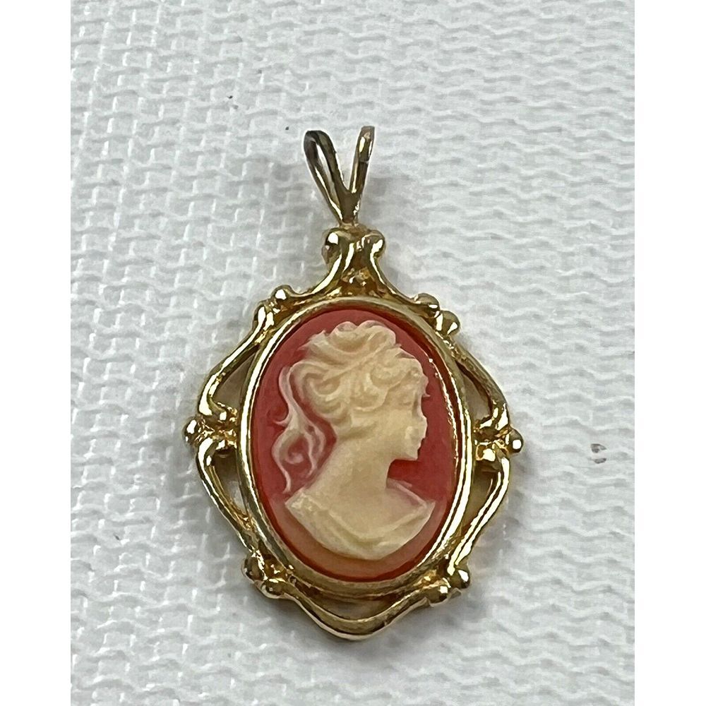 Vintage Cameo Gold Toned Metal Pendant Coral Color Background .50" x .75"
